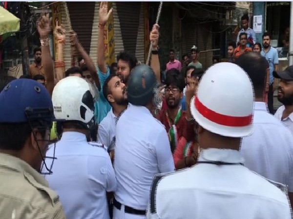 West Bengal police arrests BJYM members who were celebrating the scrapping of Article 370 in Siliguri on Monday. Photo/ANI