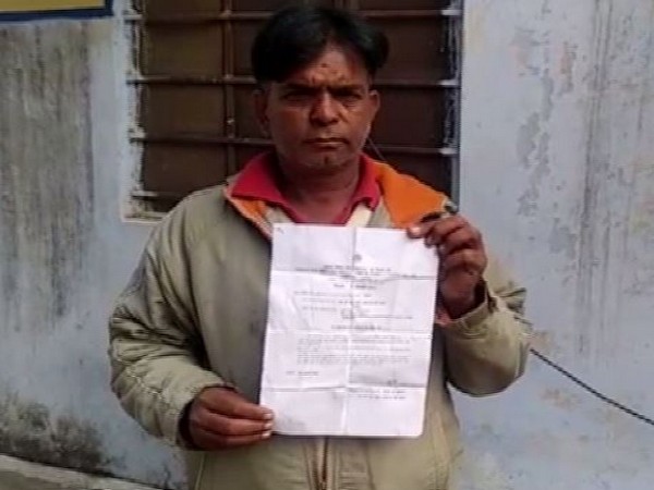 Vinod Singh with the Bank notice in Khetri , Rajasthan on Saturday 