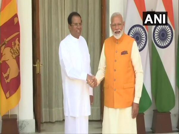 Prime Minister Narendra Modi with Sri Lankan President Maithripala Sirisena in New Delhi on Friday.