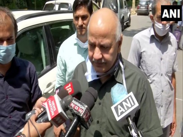Delhi Deputy Chief Minister Manish Sisodia speaking to reporters in New Delhi. [Photo/ANI]