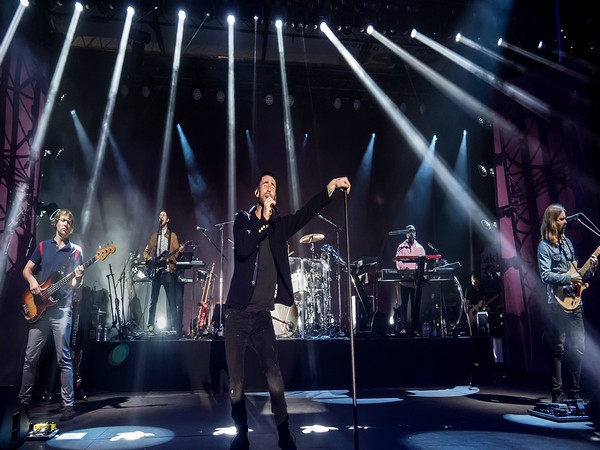 Adam Levine performing with Maroon 5