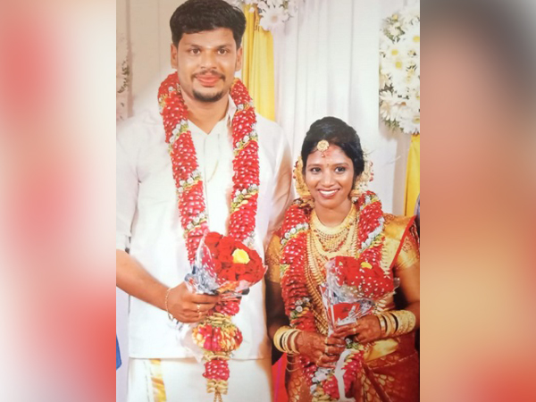 Husband Sooraj (right) and wife Uthra (right)