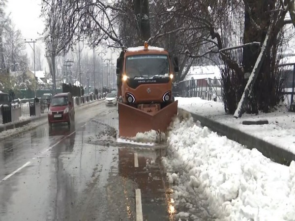 Snow clearance machine clearing the snow from the road. (Photo/ANI)
