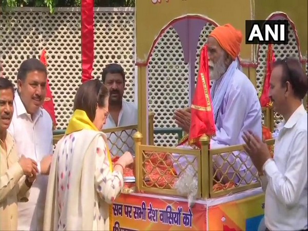 Congress president Sonia Gandhi performing rituals of 'Sobha Yatra' on the occasion of Maharishi Valmiki Jayanti at her residence in New Delhi on Sunday. Photo/ANI
