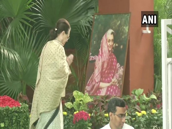 Congress interim president Sonia Gandhi pays tribute to Indira Gandhi in New Delhi on Thursday. Photo/ANI