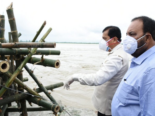 Assam Chief Minister Sarbananda Sonowal inspects flood and erosion caused by the Aie River at Tulsi Jhora in Chirang district