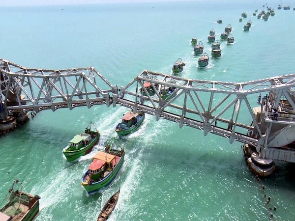 Five dug ships along with 75 fishing boats crossed the Pamban Rail Bridge after the Scherzer's span was lifted on June 28. (Photo: ANI)