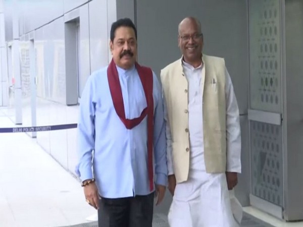 Sri Lankan Prime Minister Mahinda Rajapaksa (L) at the Delhi Airport on Friday. (Photo/ANI)