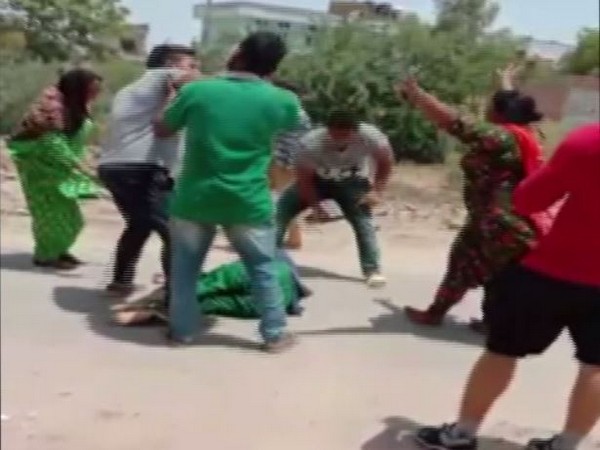 A woman was thrashed by a Congress leader's brother and his associates in Sri Muktsar Sahib, police said on Friday.