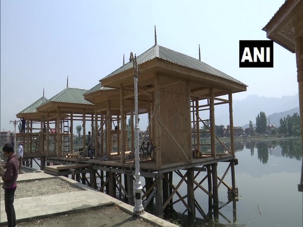 Construction of a food court and walking paths has been started on Srinagar's Brari Nambal Lake. [Photo/ANI] 