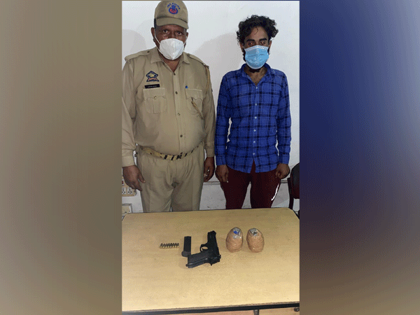 Visual of Jammu Police with arrested truck driver (right) (Photo/ANI)