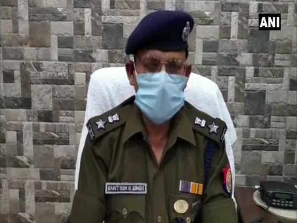 SSP Bulandshahr Santosh Kumar Singh speaking to reporter. 