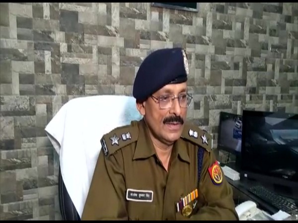 Santosh Kumar Singh speaking to reporters in Bulandshahr.