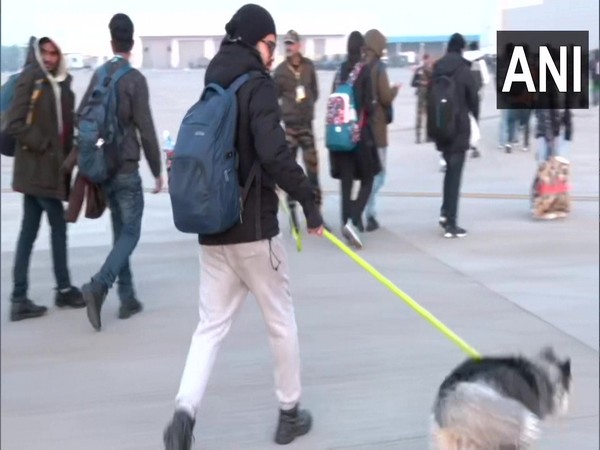 Visual of evacuated Indian Nation along with his pet dog at Hindon airbase (Photo/ANI)