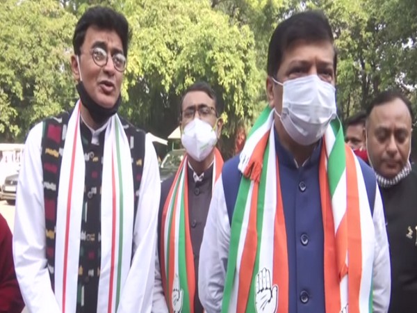 Former BJP MLAs Sudip Roy Burman and Ashish Shah after joining Congress. (ANI/photo)