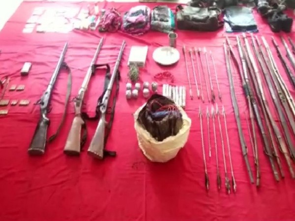 An INSAS rifle, live cartridges and an IED container recovered from possession of the deceased Naxals in Sukma. 