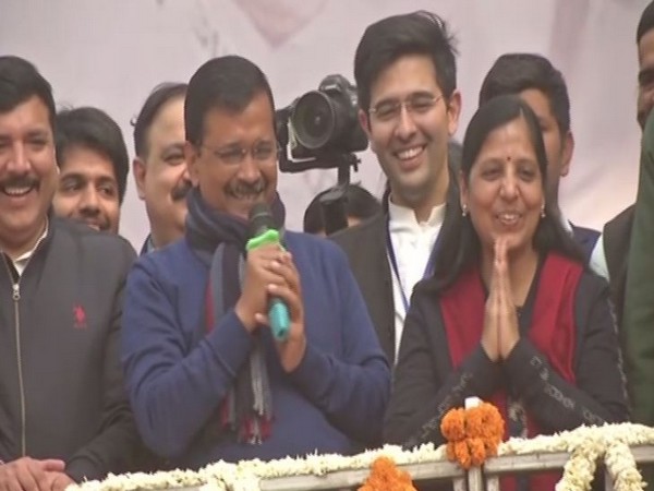 Arvind Kejriwal along with his wife Sunita at AAP office in New Delhi on Tuesday.