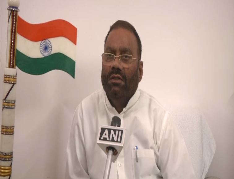 Uttar Pradesh Cabinet Minister Swami Prasad Maurya talking to ANI in Lucknow on Tuesday. (Photo/ANI)