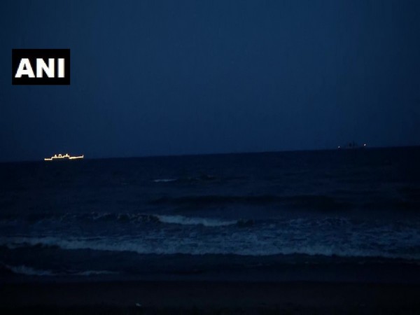 Indian Navy illuminates ships near Marina Beach to express gratitude towards frontline warriors.