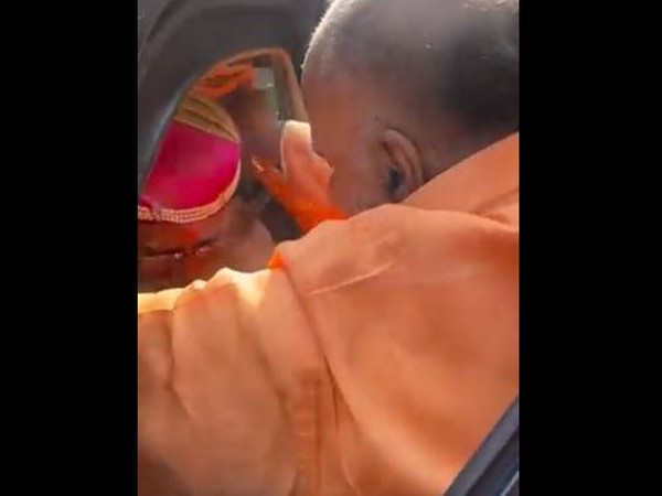 PM Modi accepts turban, scarf from local. (Photo/ ANI)