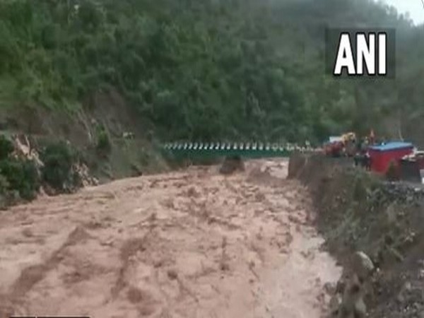 Tumultuous flow in Tawi river as the river swells due to incessant rainfall in Toldi Nullah area in Udhampur district, Jammu & Kashmir. (ANI/photo)