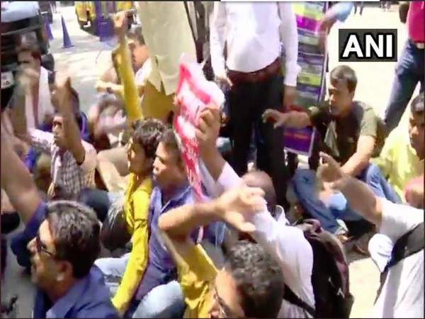 Primary school teachers holding a protest in Kolkata on Monday.