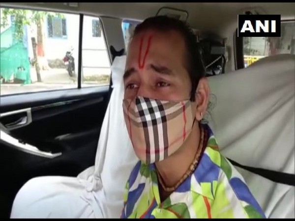 RJD leader Tej Pratap Yadav speaking to reporters on Friday. 