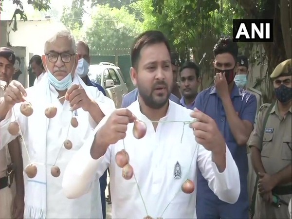 RJD leader Tejashwi Yadav speaking to media in Patna on Monday. (Photo/ANI)
