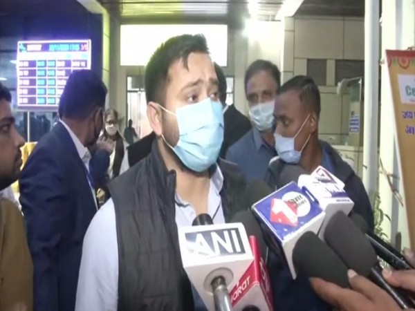 RJD leader Tejashwi Yadav speaking to media on Sunday. 