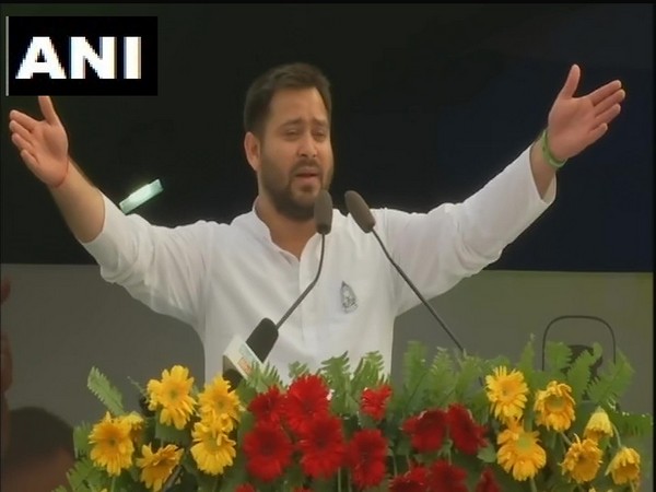 RJD leader Tejashwi Yadav addressing Berozgari Hatao Yatra in Patna on Sunday. Photo/ANI