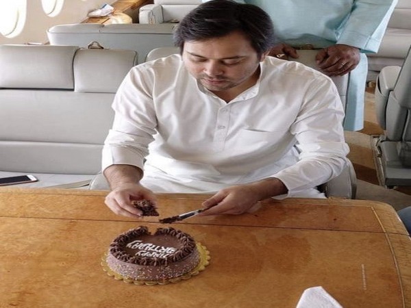 RJD) leader Tejashwi Yadav shared his picture cutting cake on charted plane on his birthday