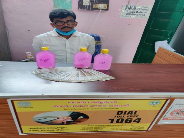 The junior assistant arrested for bribery and the amount recovered (Photo/ ANI)