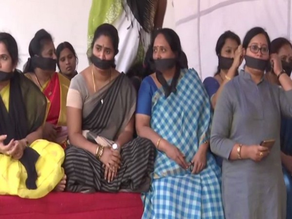 BJP Mahila Morcha on Saturday held a silent protest in Telangana's Hyderabad. Photo/ANI