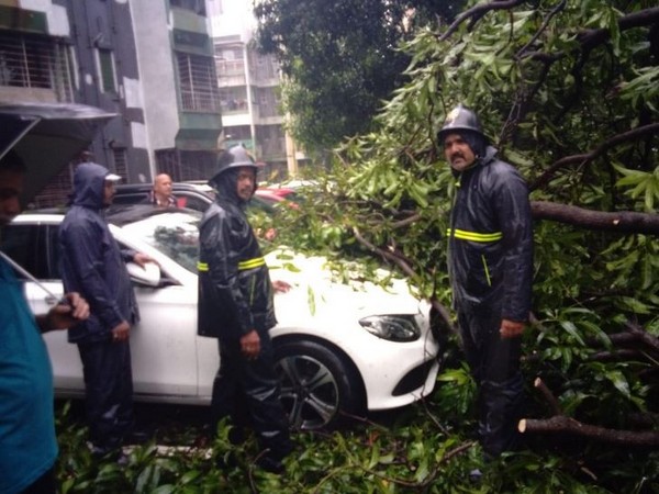 Fire brigade workers on the spot to mitigate the situation in Raheja Garden area, Thane. (Photo/ANI)