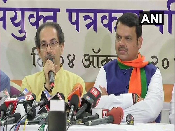 Uddhav Thackeray and Devendra Fadnavis addressing press conference in Nagpur on Friday 