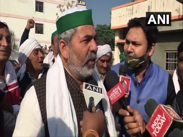 Rakesh Tikait speaking to reporters in Meerut on Saturday.