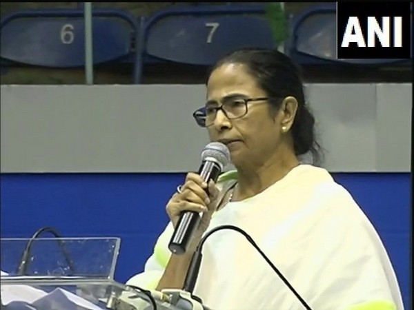 Chief Minister Mamata Banerjee speaking during Trade Union meeting at Netaji Indoor Stadium, Kolkata on Monday. 