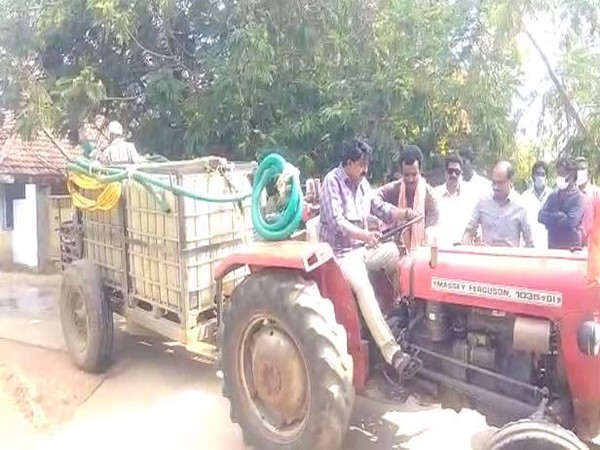 Andhra Pradesh Transport Minister Perni Venkatramaiah drove a tractor in Krishna district. Photo/ANI