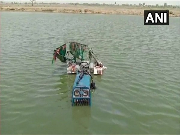 Tractor that fell into a pond in Bharatpur on Sunday. (ANI)