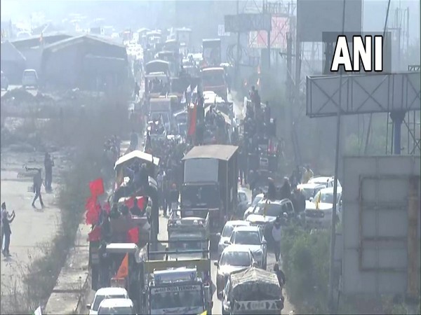 Slow traffic movement seen at KMP flyover near Singhu border (Photo/ ANI)