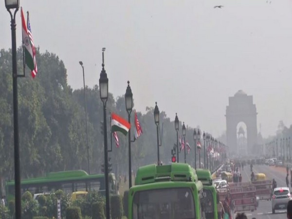 Roads leading to India Gate and Rashtrapati Bhawan decorated with India and American Flags. Photo/ANI