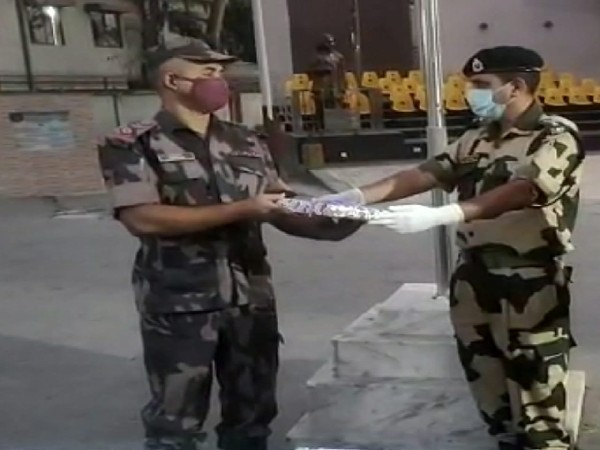 BSF exchange sweets, greetings with BGB on Diwali eve on Wednesday. (Photo/ANI)