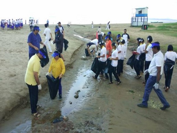 Members of the Indian Coast Guard while cleaning various beaches in Karwar here on Saturday. Photo/ANI