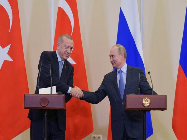 Russian President Vladimir Putin with Turkish President Recep Tayyip Erdogan addressing a press conference after their talks in Sochi