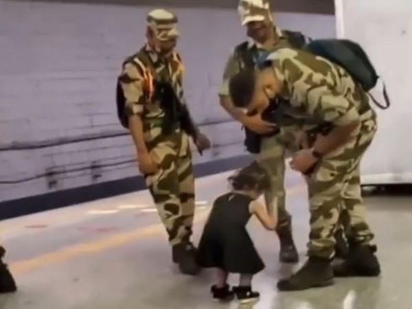 Viral video of little girl touching army man's feet