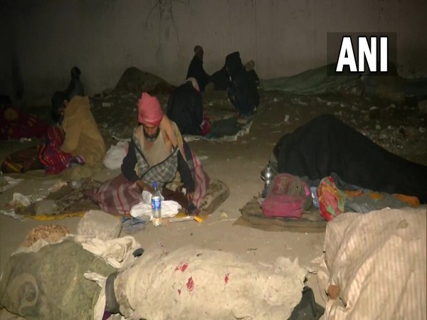 Homeless people sleeping below underpass near Kashmiri Gate ISBT (Photo/ANI)