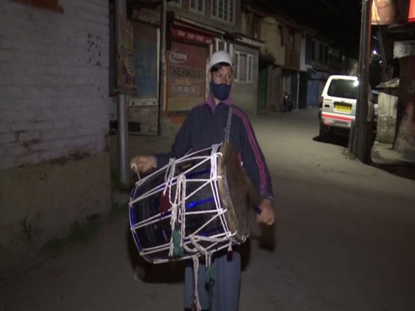 Traditional drum beater in Srinagar, Nazir Ahmad (Photo/ANI)