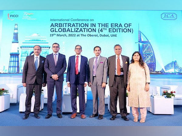 N. V. Ramana, Chief Justice of India, Sunjay Sudhir, Amb. of India to UAE along with speakers at 4th edition of International Conference on 'Arbitration in the Era of Globalization' in Dubai