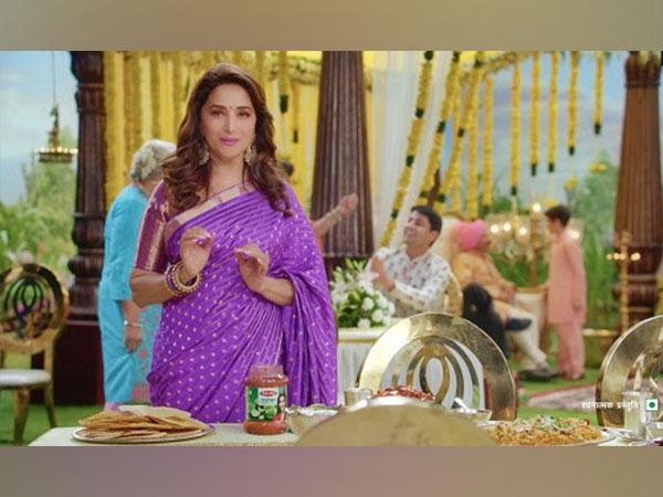 Brand Ambassador Madhuri Dixit with Rambandhu pickle and papad