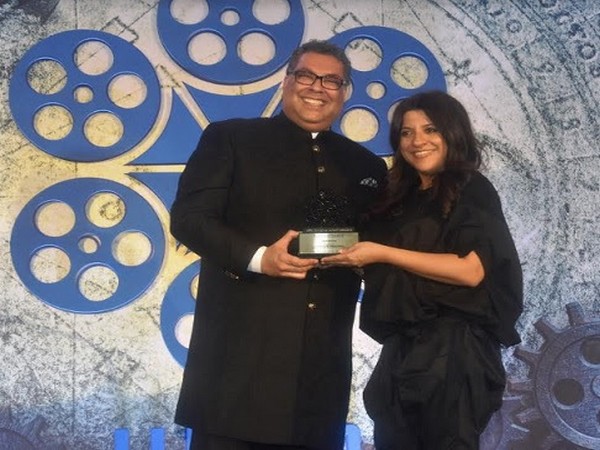 Mayor of Calgary, Canada Naheed Nenshi presenting award to Bollywood Director Zoya Akhter at IIFTC Awards 2020 Ceremony held in Mumbai